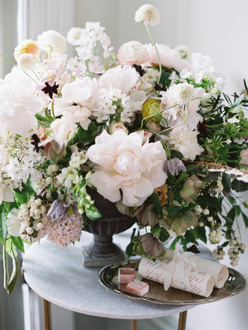 white luxury floral design with peonies and roses