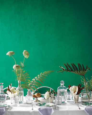 greenery-in-vases-green-wall