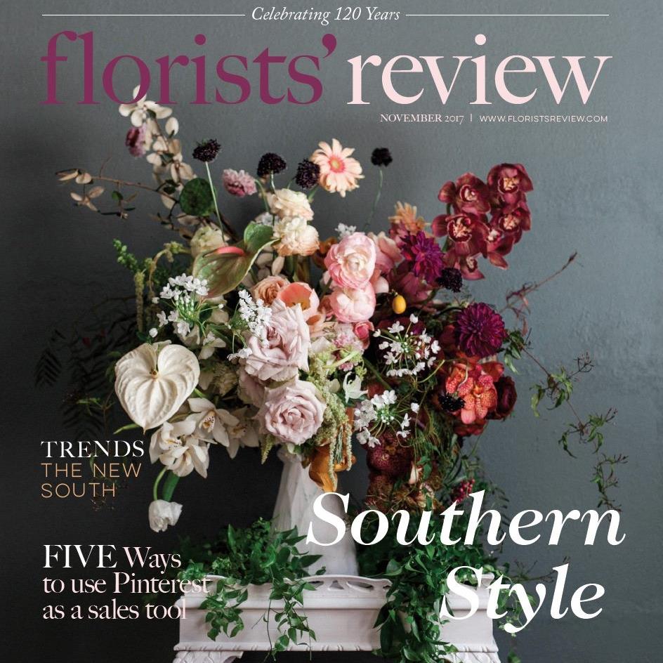 See Christy Griner Hulsey and Colonial House of Flowers luxury garden style floral  arrangement in white vase on the cover of Florists Review magazine