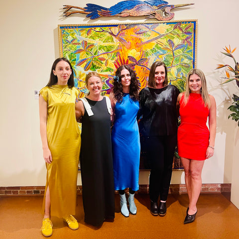 five women in evening gala dresses at museum of art in dothan alabama