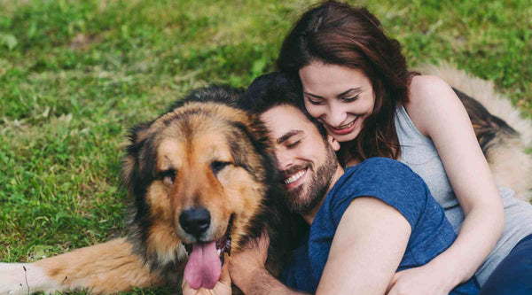 Young couple with dog