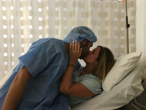 Erik and Natalie kissing during IVF retrieval 