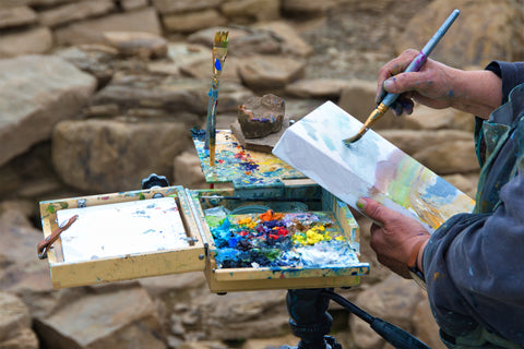 photo of me painting at the Ness of Brodgar orkney..jeanne bouza rose