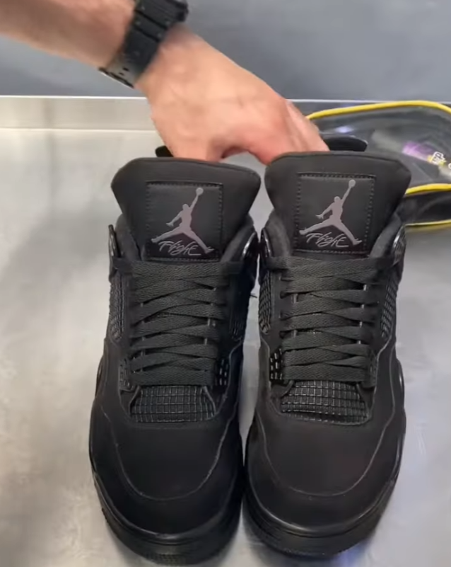 Final touches to the Air Jordan 4 'Black Cat'