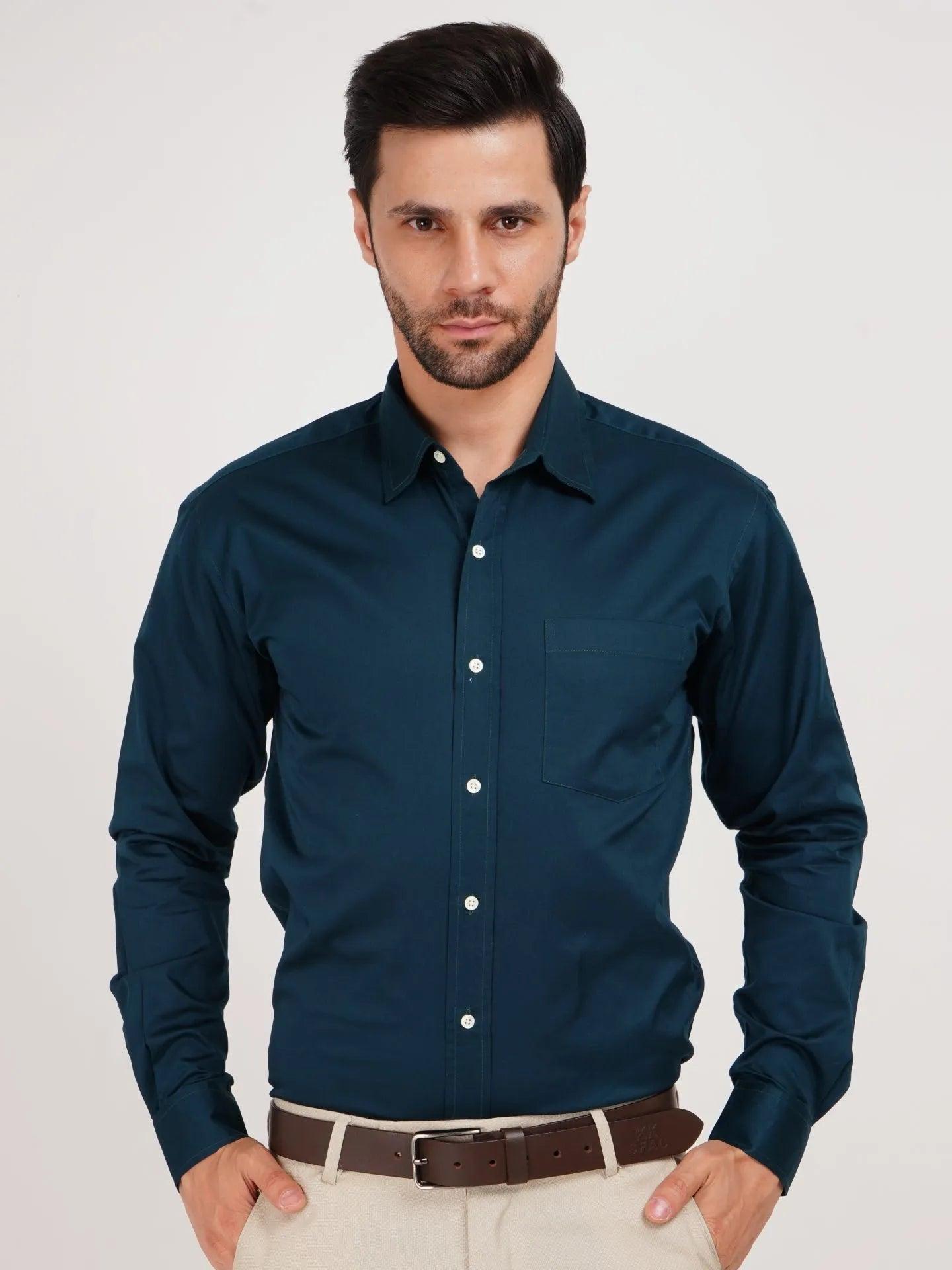 Kollarz and Kreazez Teal Shirt made from pure cotton is epitome of luxury. This dark teal blue shade is the trend of today, and reflects your bold personality. Display authority with this teal colour shirt.