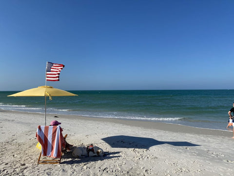 Yellow beachBUB all-in-one beach umbrella system.