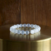 bracelet en sélénite sur fil élastique - perles rondes - pierre blanche naturelle