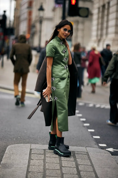 woman in green outfit