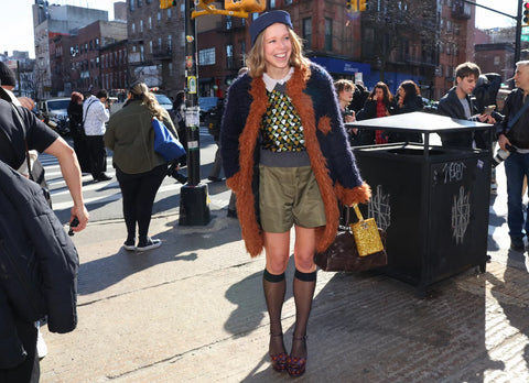 woman with cardigan, shorts and long  sheer socks