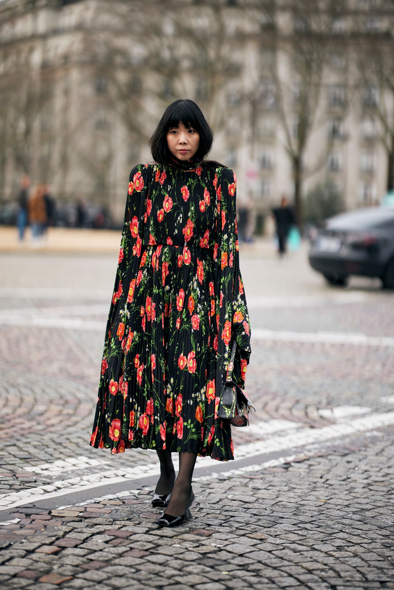 woman in printed midi dress