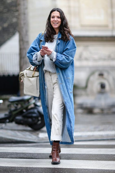 woman wearing a denim overcoat