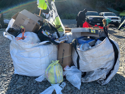 piles of trash at a campsite