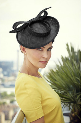 http://tegenaccessories.com/collections/niche-collection/products/black-madeleine-bow-disc-fascinator