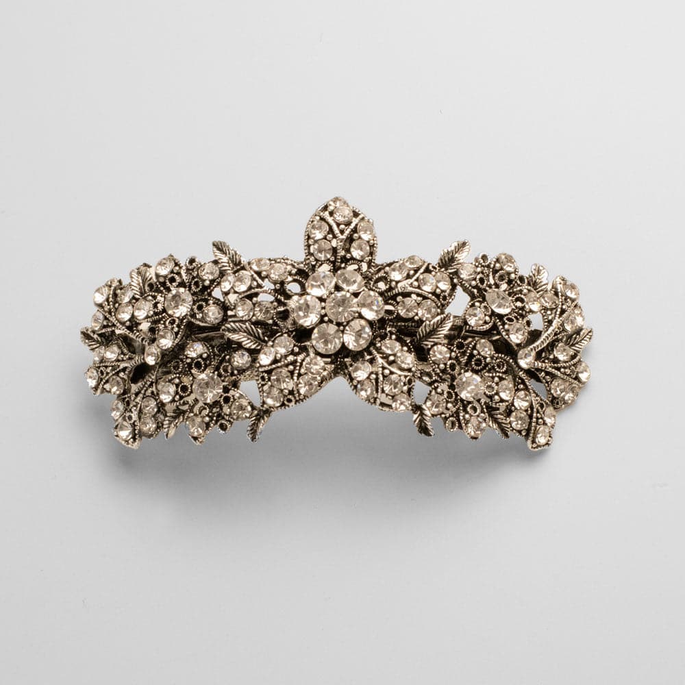 https://cdn.shopify.com/s/files/1/0600/6397/files/Silver-Crystal-Bloom-Barrette-Clip-in-by-Rosie-Fox-at-Tegen-Accessories.jpg?v=1698523161&width=1000