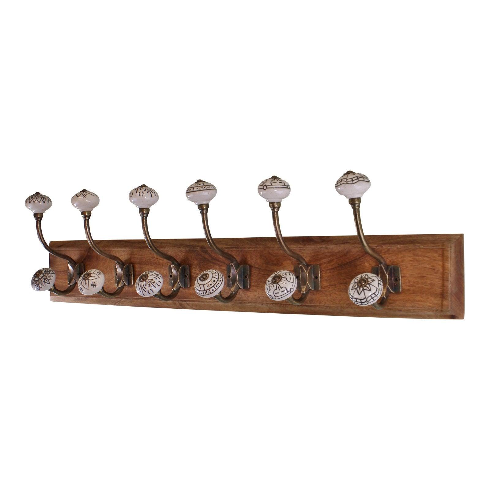 View 6 Double Ceramic Ivory Coat Hooks On Wooden Base information