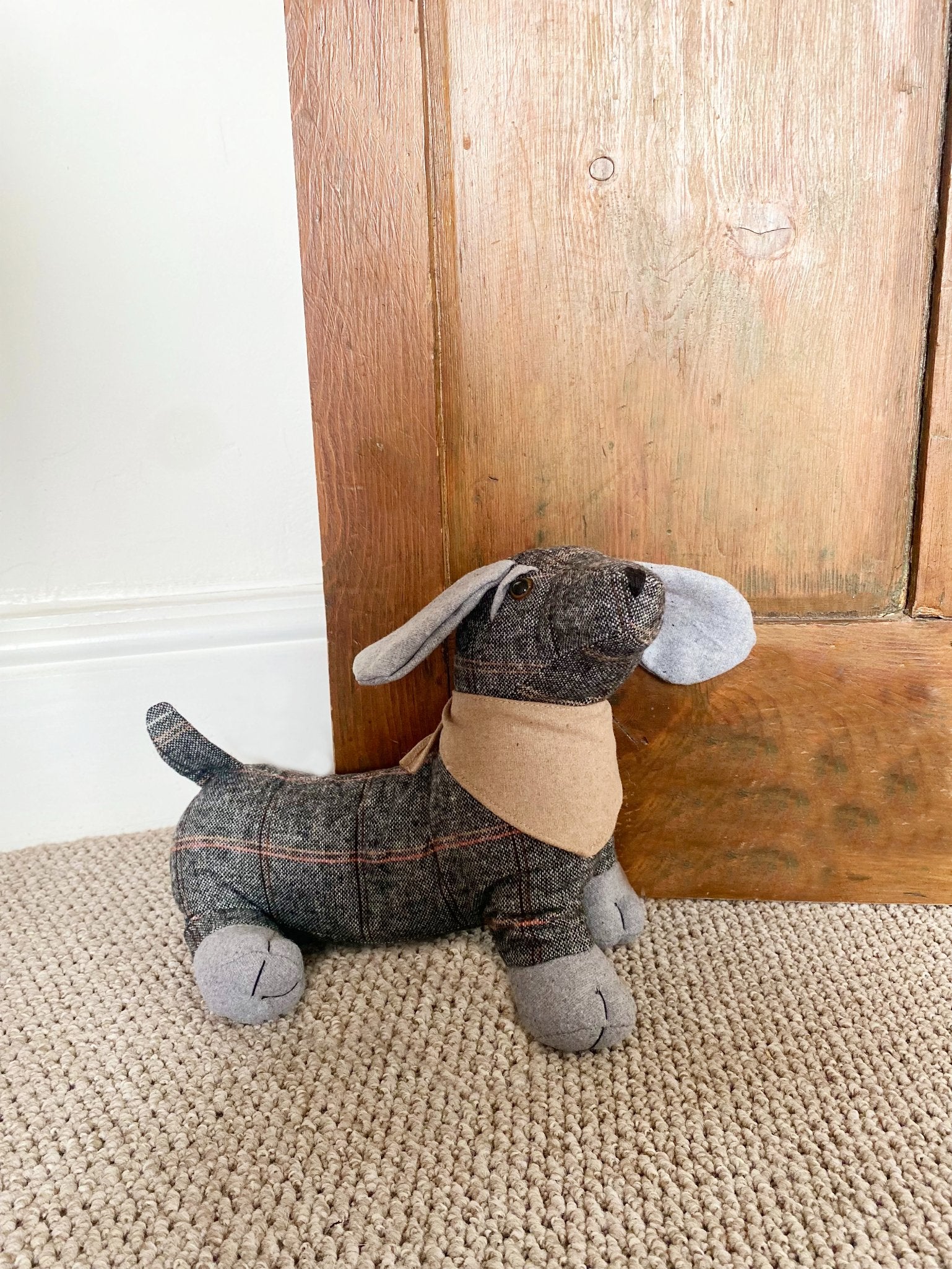 View Tartan Fabric Sausage Dog Doorstop with Natural Bandana information