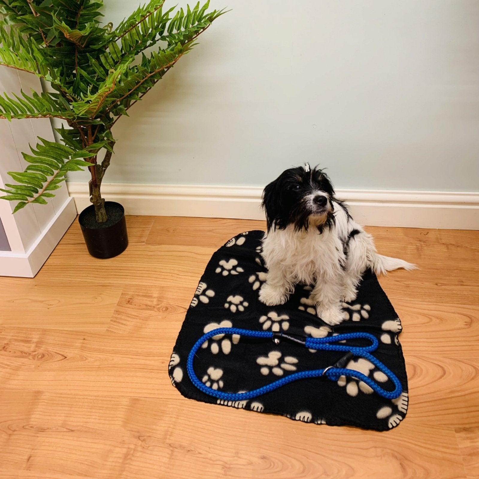 View Black Paw Print Fleece Throw 60cm information