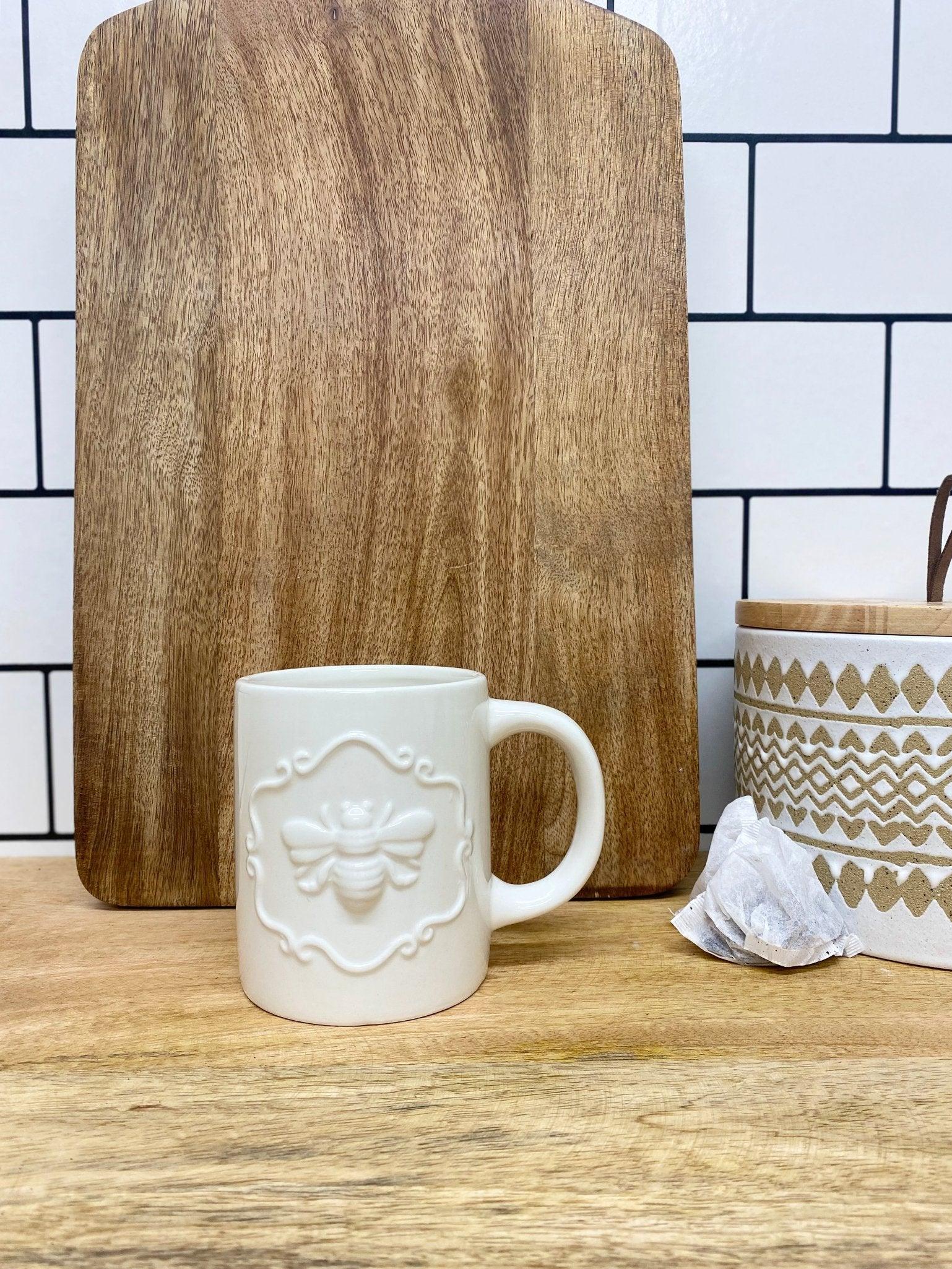 View Cream Ceramic Embossed Bee Mug information