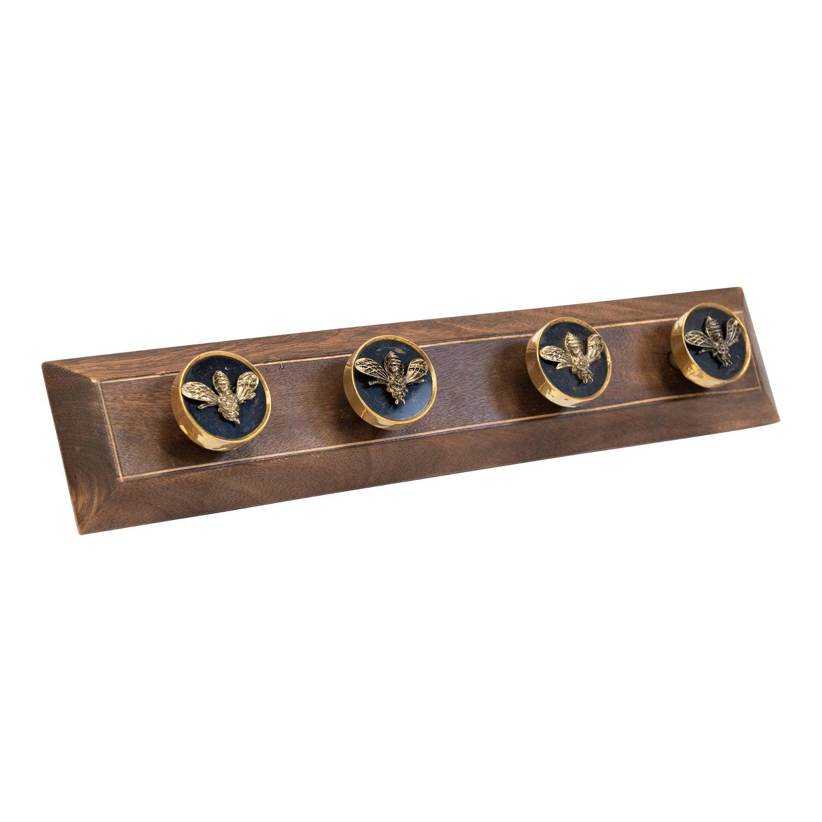 View Four Bee Design Coat Knobs On A Wooden Base information