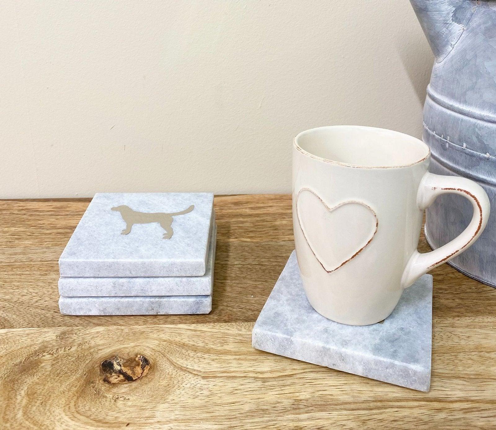 View Four Square White Marble Coasters With Gold Dog Design information