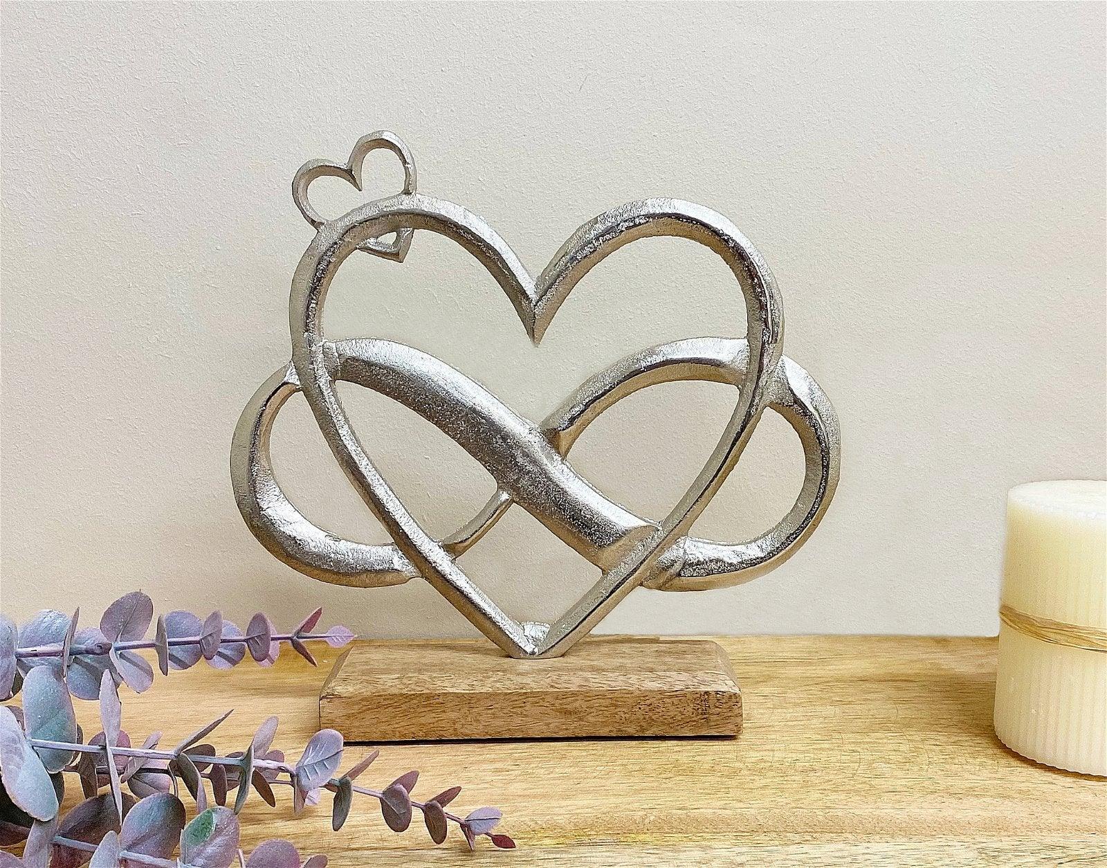 View Metal Silver Entwined Hearts On A Wooden Base Medium information