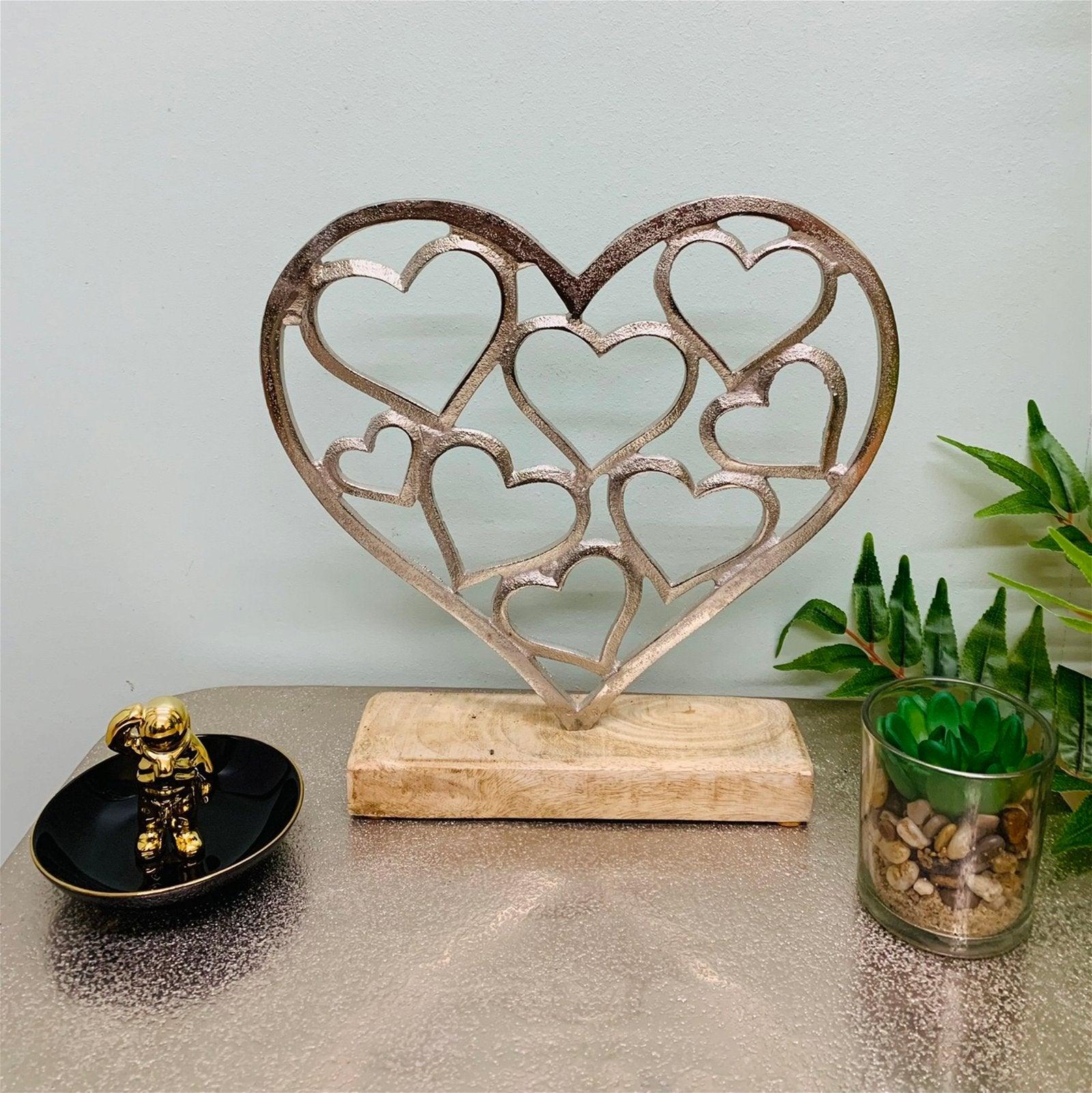 View Metal Silver Hearts On A Wooden Base Small information