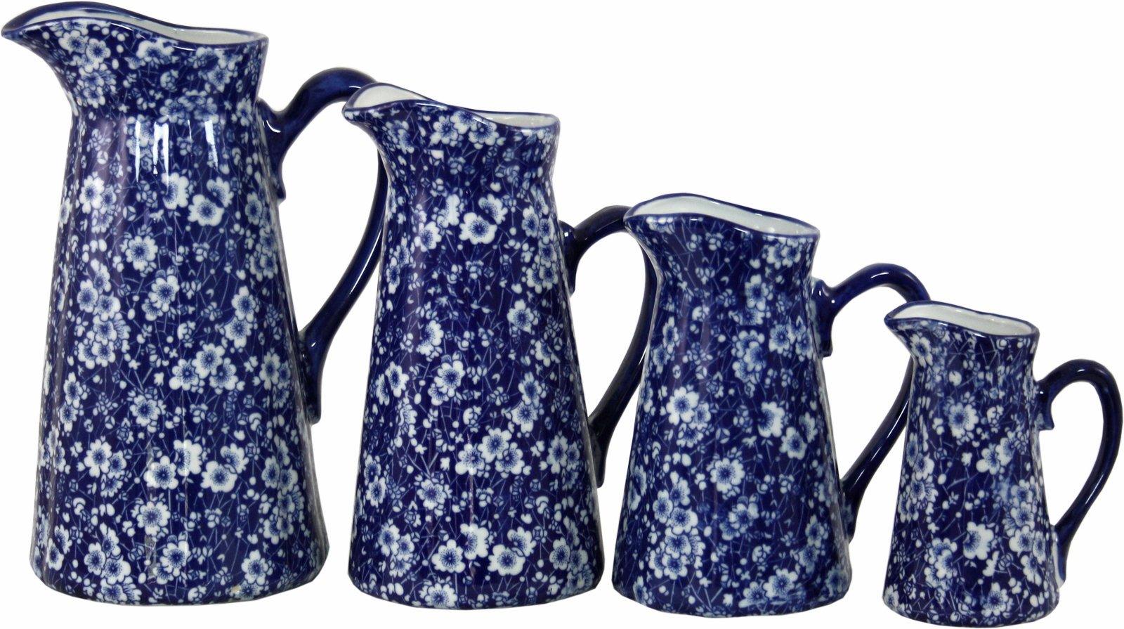 View Set of 4 Ceramic Jugs Vintage Blue White Daisies Design information