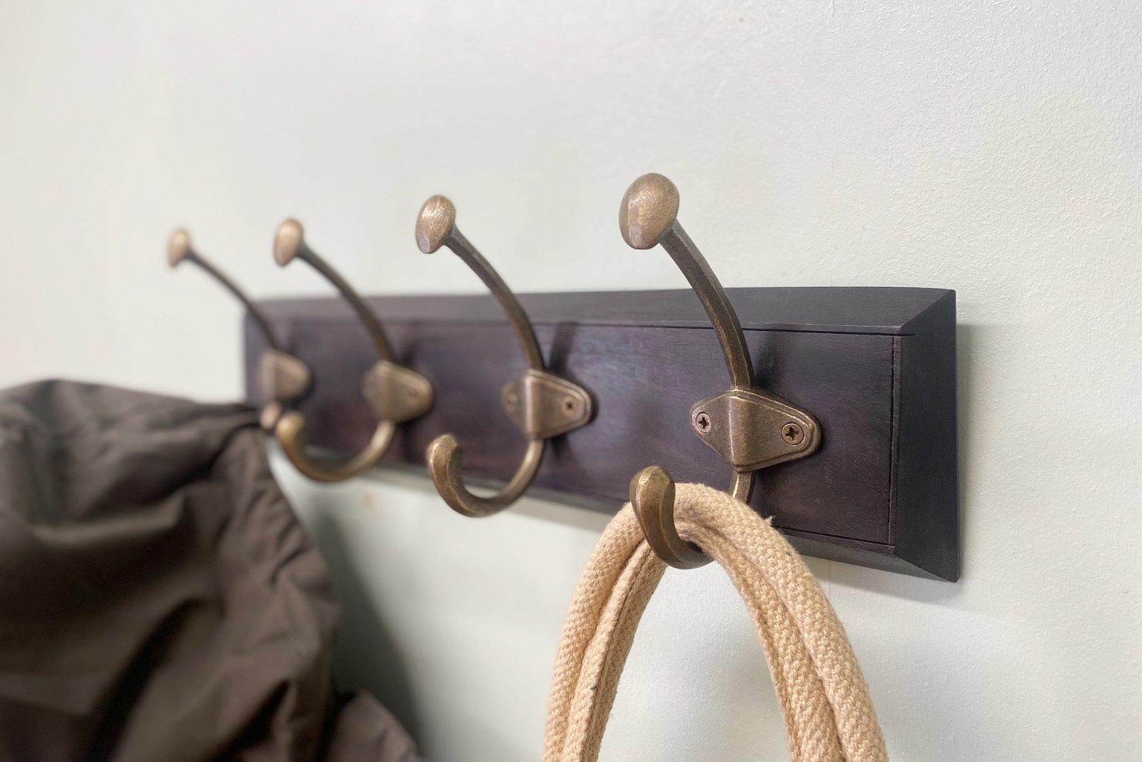 View Wooden Base With 4 Brass Coat Hooks information