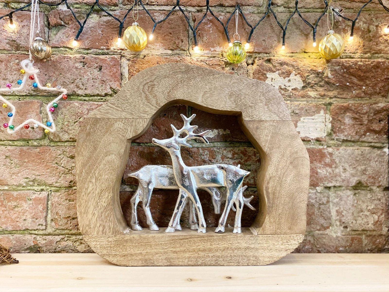 View Wooden Log With Silver Metal Reindeers information