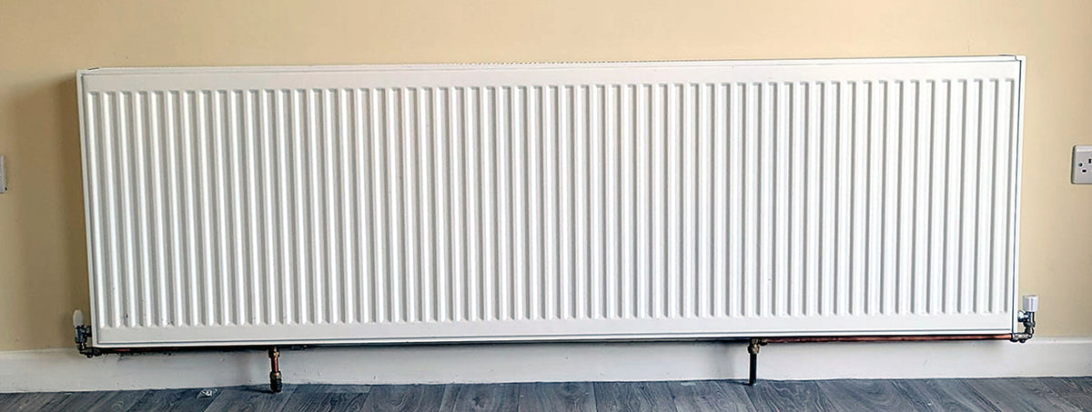 Steel radiator in a retrofitted home