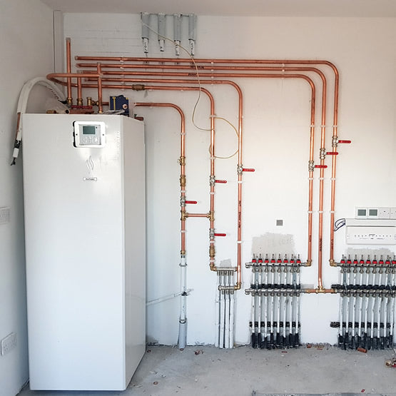 Hitachi Air to Water Heat Pump indoor unit in plant room