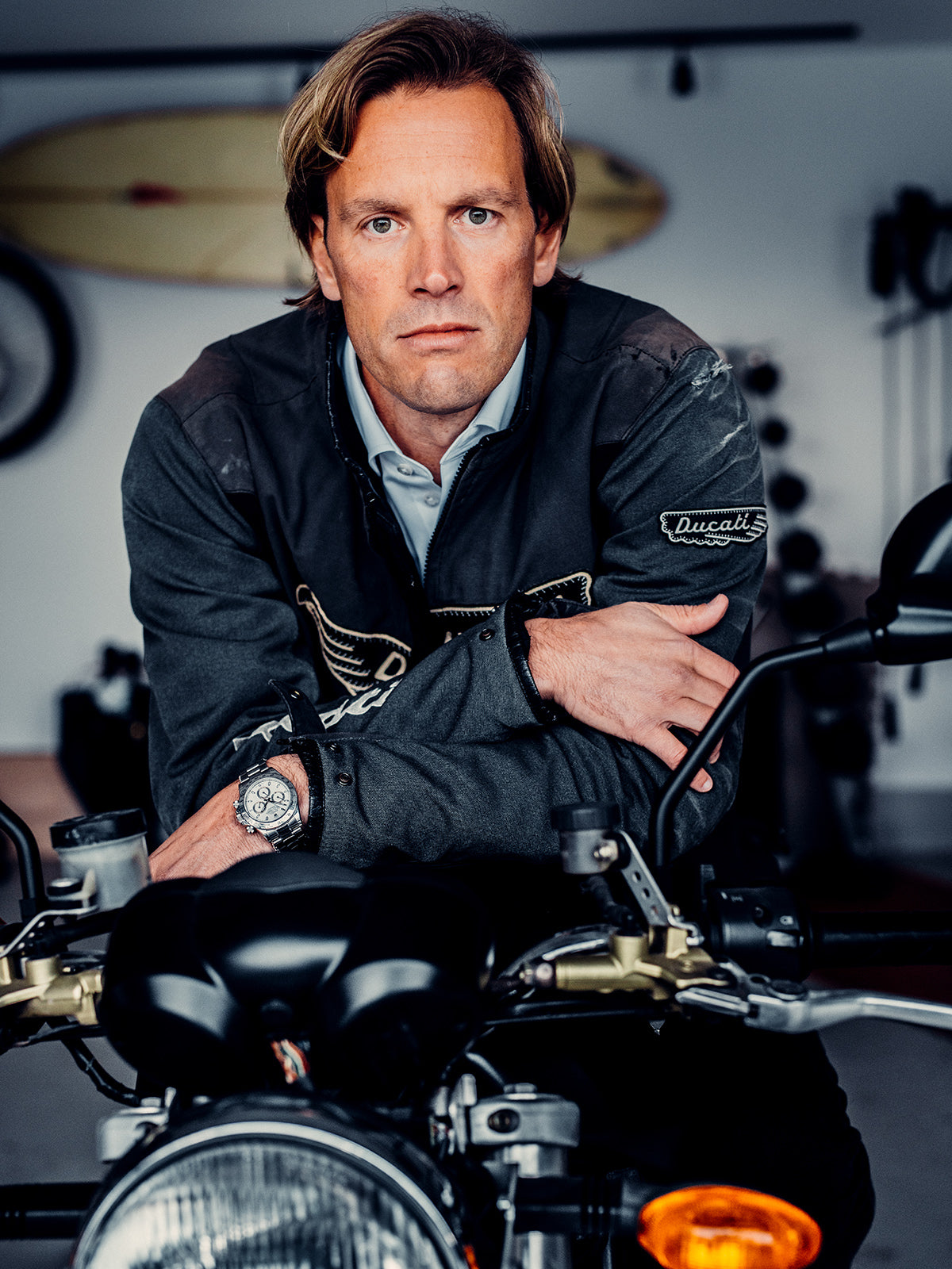 TC Høiseth on motorcycle in barons business shirt