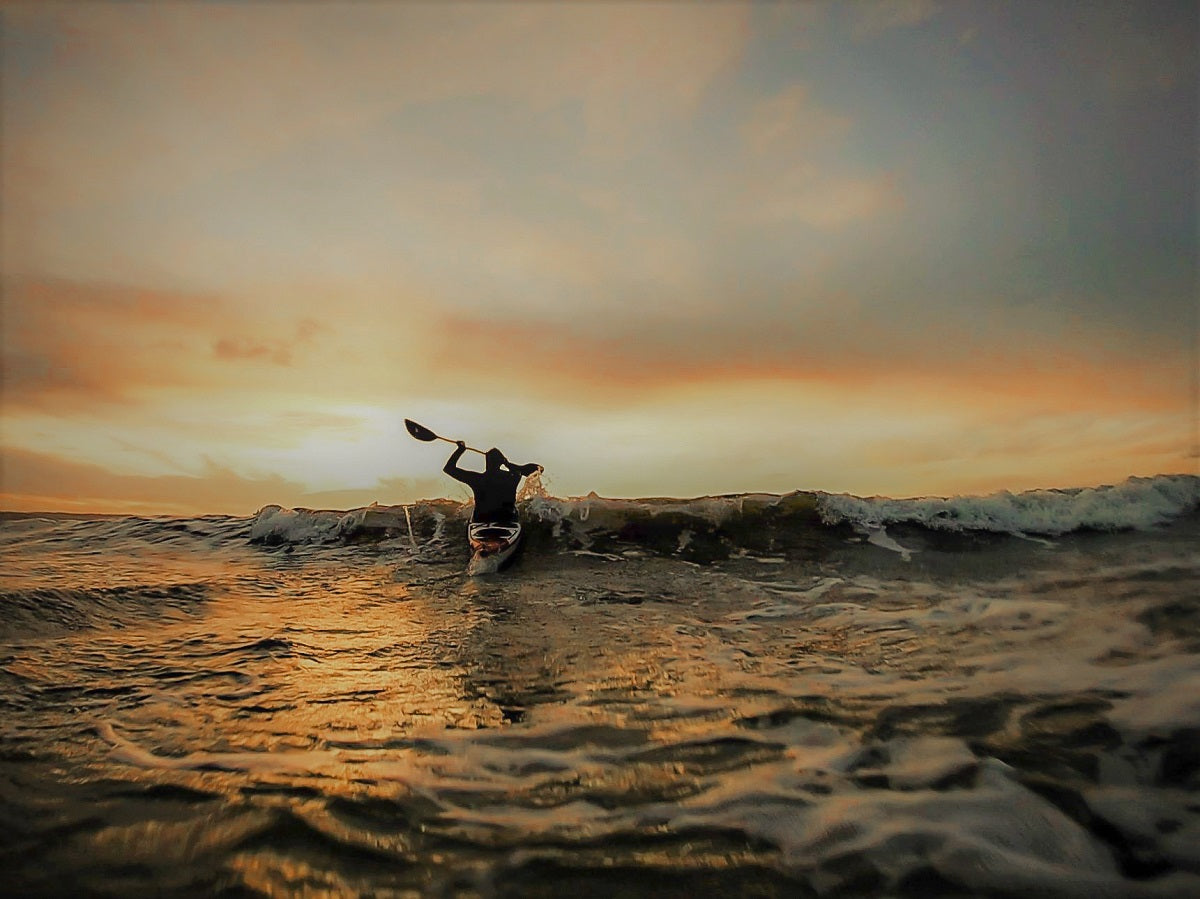 Paddling the Norse Bylgja through small surf