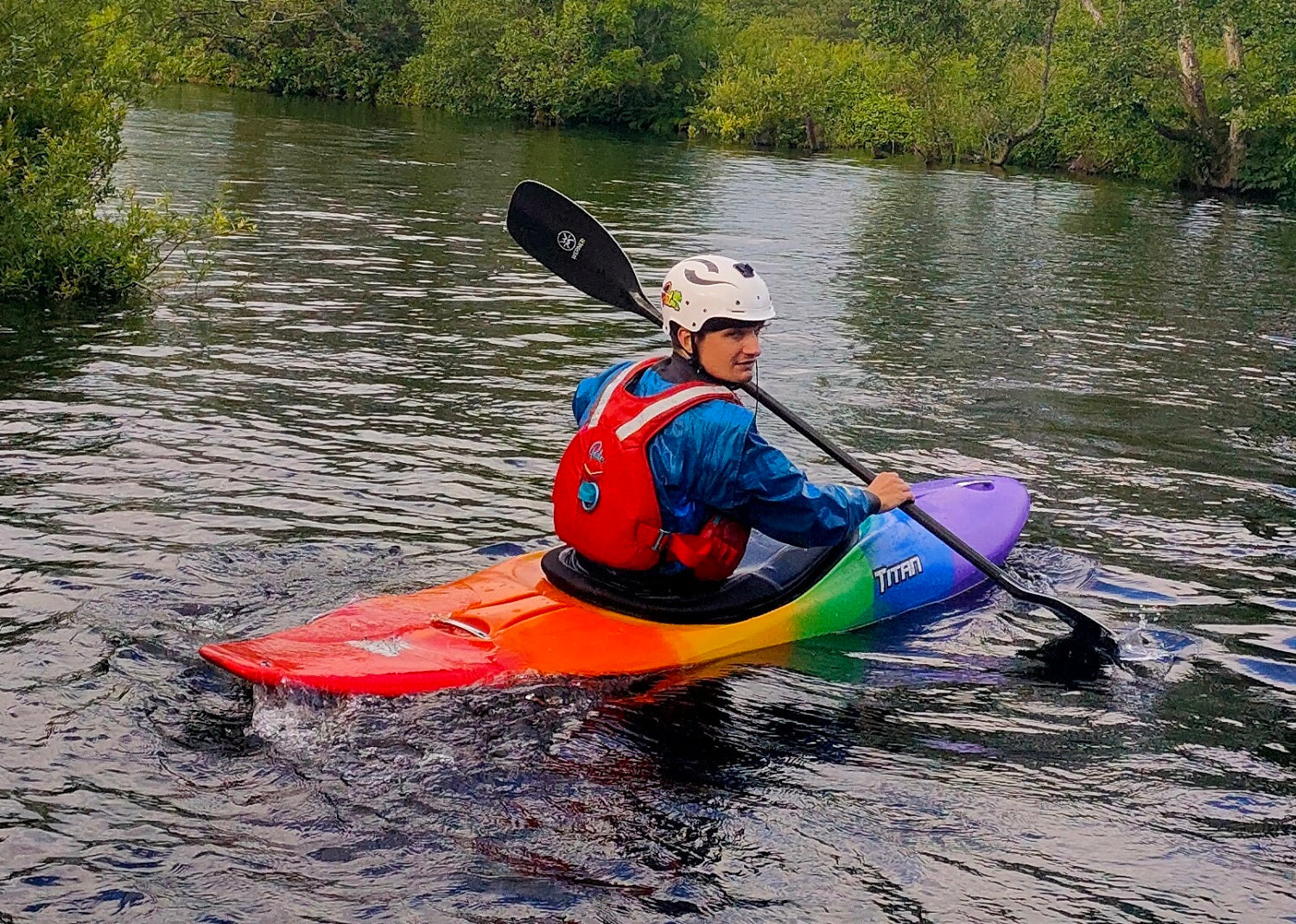 White Water Paddler Kayaking with a Buoyancy Aid