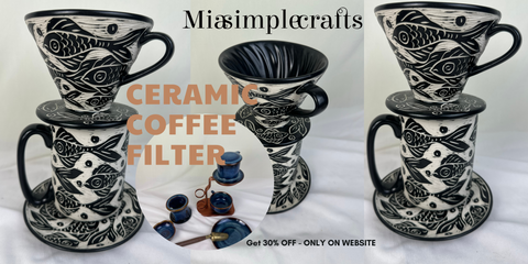 Ceramic Coffee Filter - A white ceramic coffee filter with a handle, perfect for brewing your favorite cup of coffee