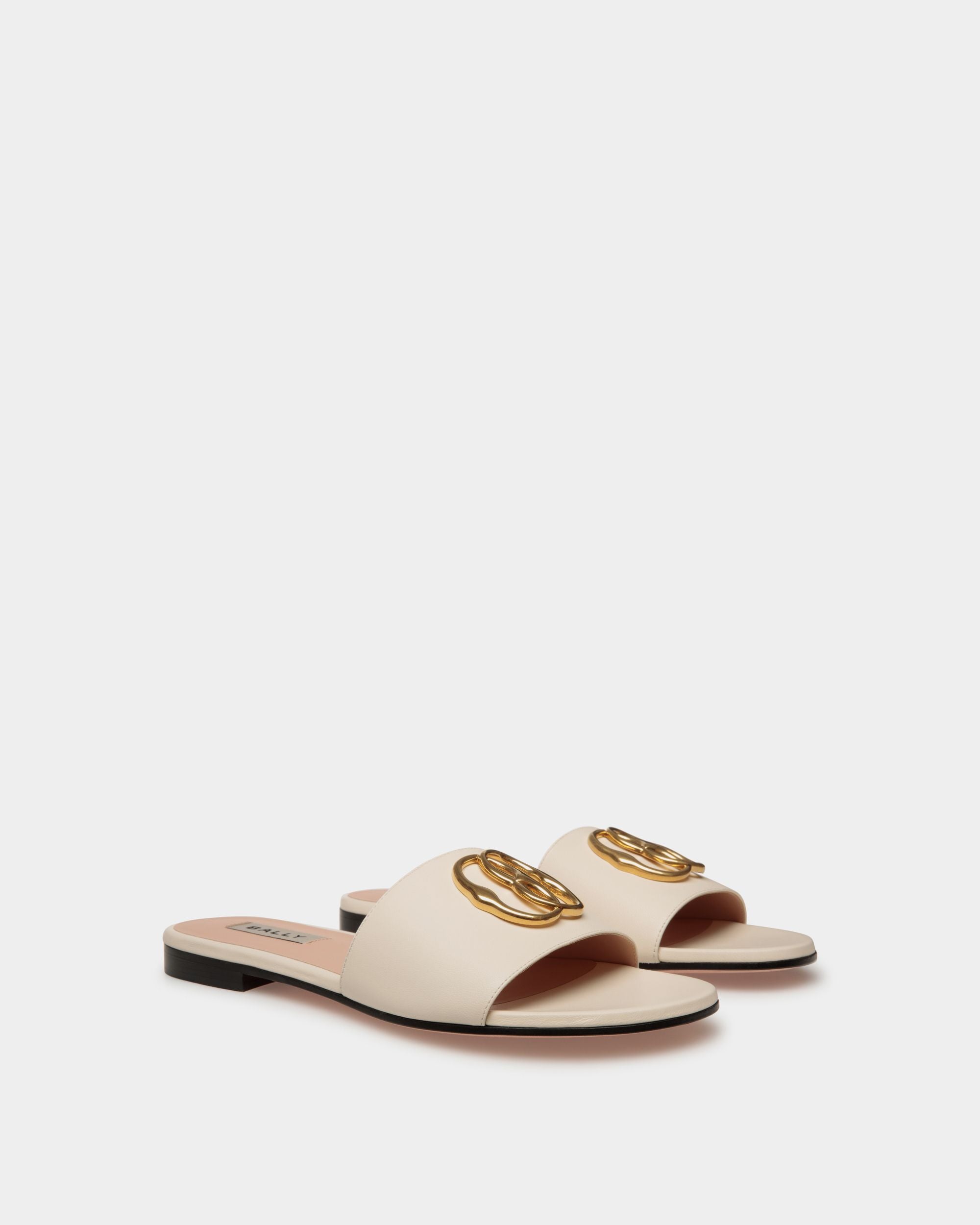 Emblem | Women's Flat Slide in White Nappa Leather | Bally | Still Life 3/4 Front