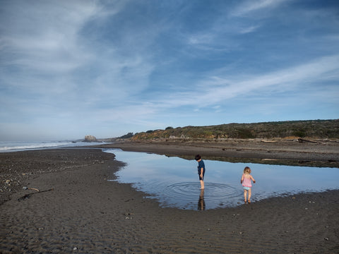 Setting a message in a bottle free at San Simeon State Beach from the Washburn Day Use Area on California's central coast