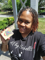 Schells outside with rainbow soap bar