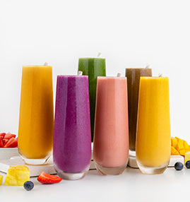 six colorful smoothies in glass flutes