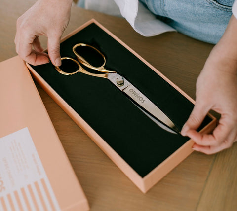 A pair of large gold sewing shears