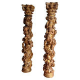 Carved gilt wood columns, Pair