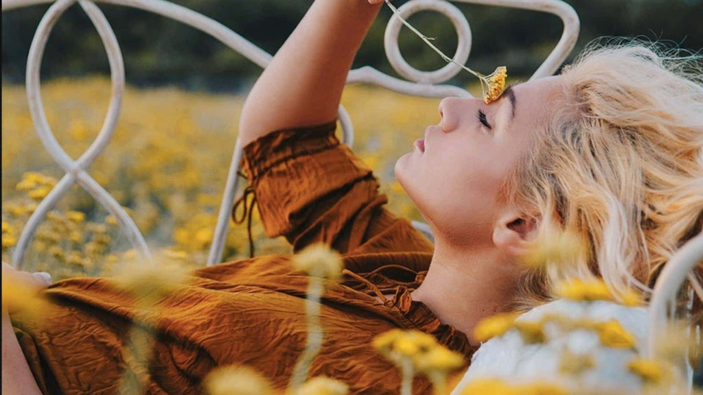 girl holding a flower