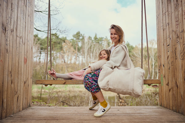 mom with her daughter and cream corduroy bag for mom by bettys home