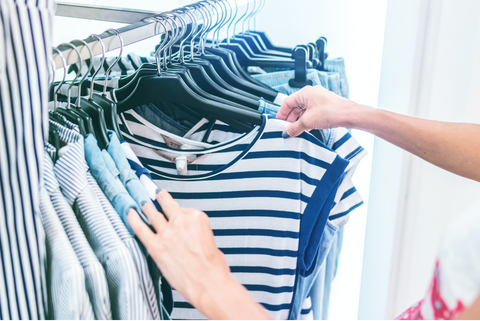 Clothing items stored neatly on a rack