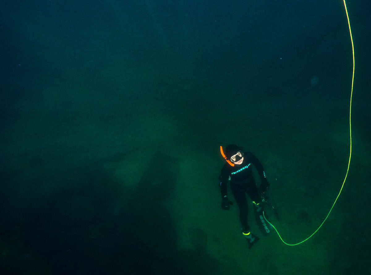 Young freediver on his way to the surface