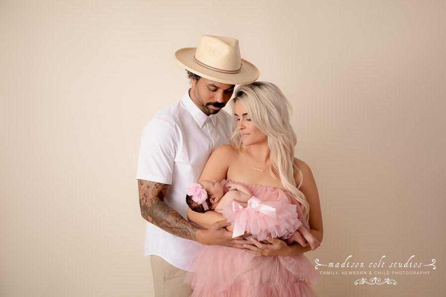 Newborn and Family Photographer