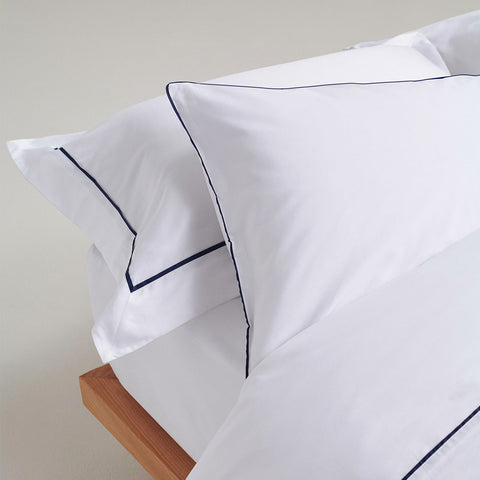 Rise & Fall bedding set in White with Navy Piping