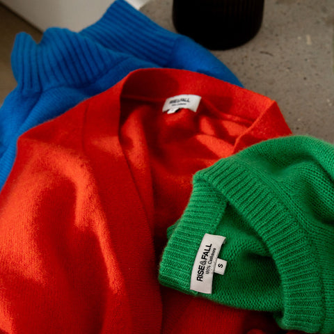 a blue, red and green cashmere jumper