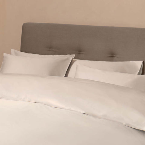 image of white bedding on a bed