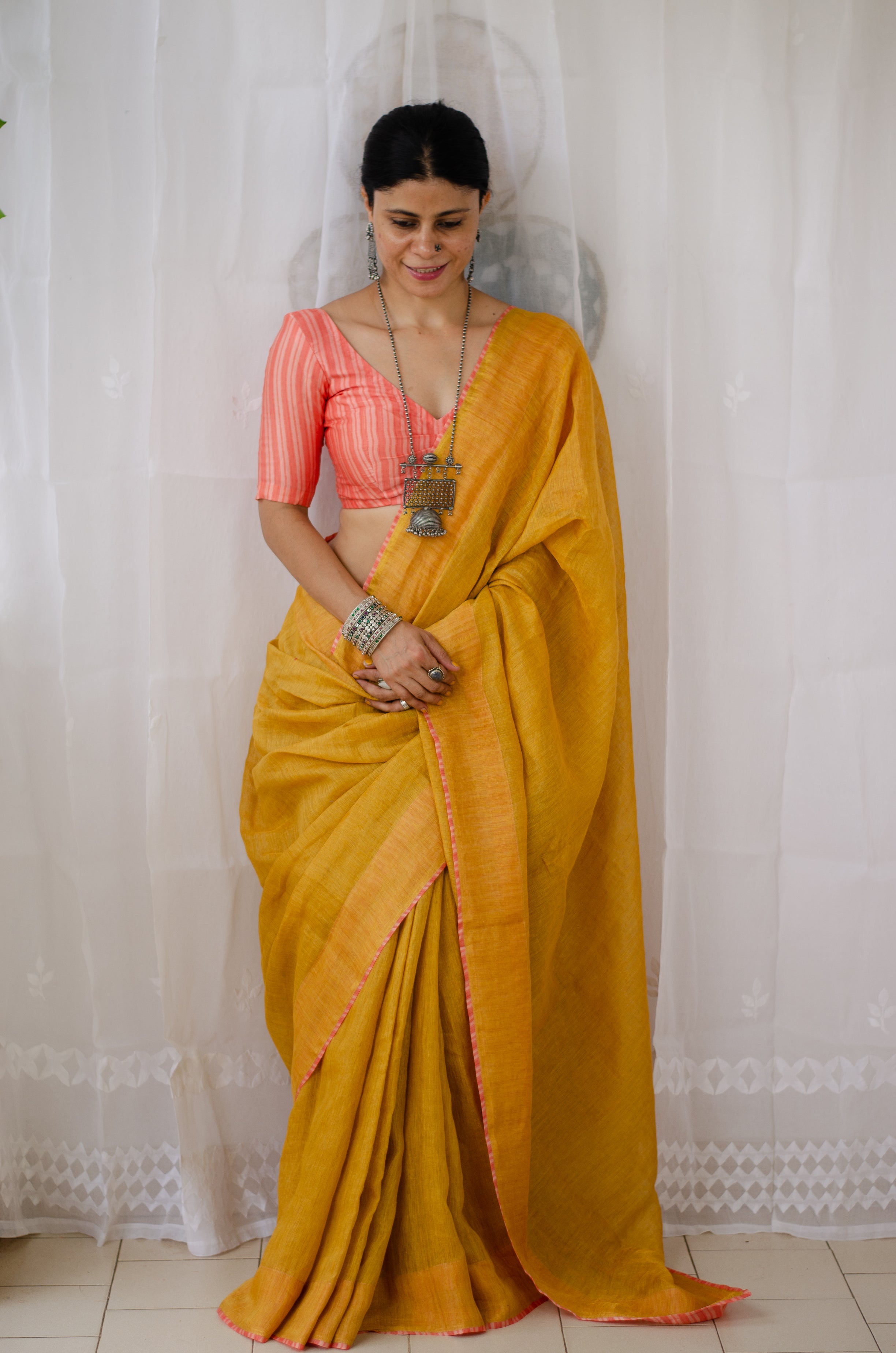 GOLDEN METALLIC LINEN SARI WITH WOVEN BORDER & TASSELS – Weavekala